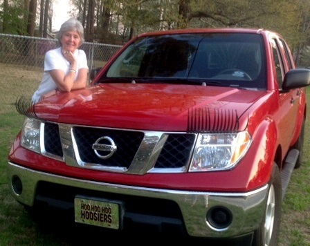 Jane and her "flirty" truck.  How 'bout them eyelashes?!